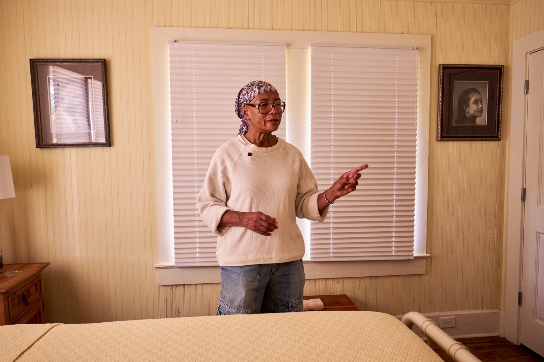 A family member speaking to camera in a home interior